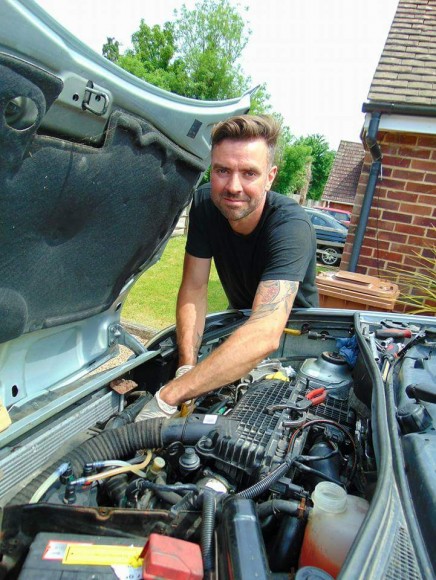 Paul from PM Autotech, Servicing a car in Crawley. West Sussex